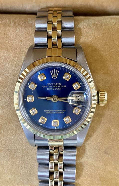 ladies rolex blue face.